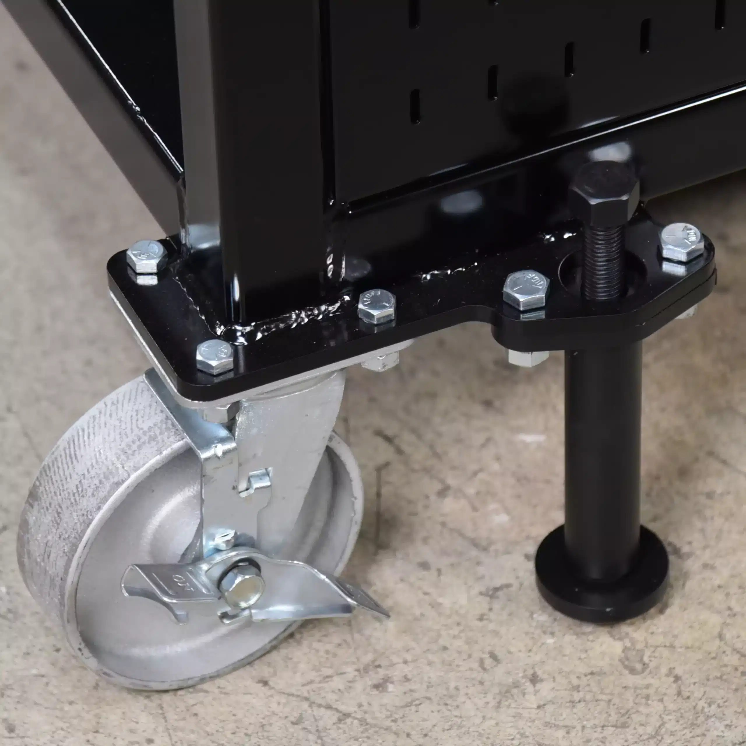 Close-up of Weld Table Leveler Bracket with wheel