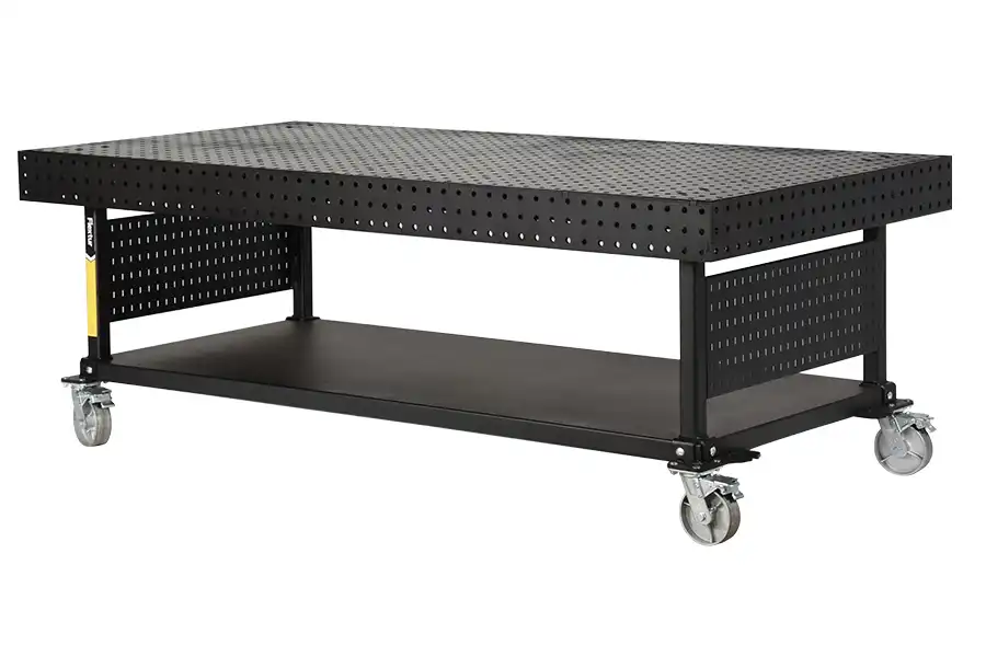 A black metal workbench with a perforated tabletop and sides, a solid lower shelf, and four swiveling caster wheels for mobility.